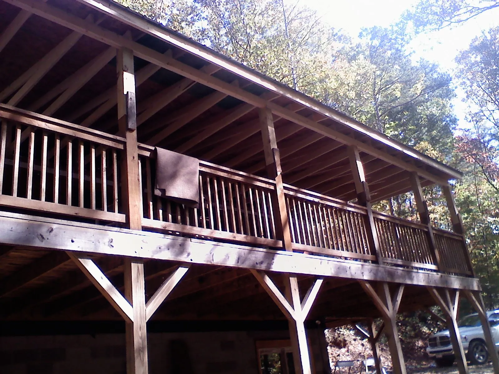 Timber framing under a new elevated porch and deck — Roof Leak Repair in Auburntown by Roofing Brothers